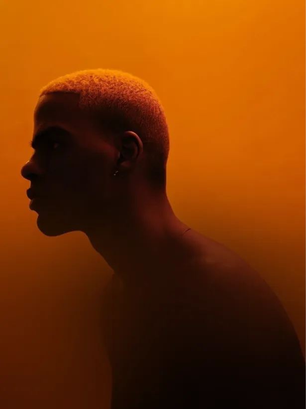 Orange-lit profile portrait for the Dutch Complete hormone test